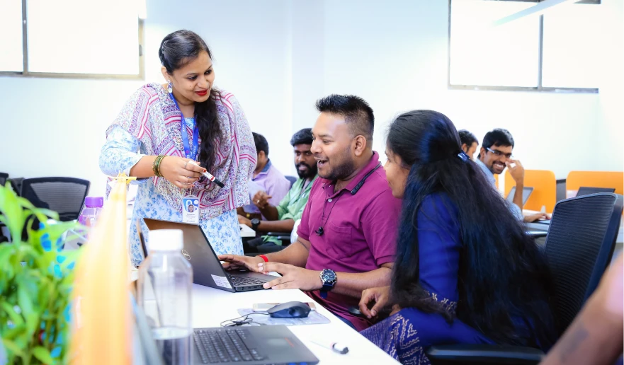 Clinikk team members collaborating in the office.